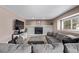 Cozy living room with a brick fireplace and comfortable seating area at 6062 S Newport St, Centennial, CO 80111
