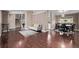 Inviting living room boasts hardwood floors and a modern sitting area at 6062 S Newport St, Centennial, CO 80111