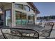 Back patio with a view of the pool at 5371 Hazel Rd, Evergreen, CO 80439