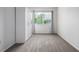 This bedroom offers natural light from a large window and includes a built-in wardrobe closet at 5238 S Jericho Way, Centennial, CO 80015
