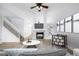 Spacious living room with a fireplace, modern decor, and ample seating for entertaining Gathering and friends at 5238 S Jericho Way, Centennial, CO 80015