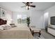 Comfortable main bedroom with carpeted floor, ceiling fan, and decor at 5238 S Jericho Way, Centennial, CO 80015