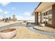 Expansive roof deck overlooking the Denver skyline with seating areas and decorative rock gardens at 550 E 12Th Ave # 1203, Denver, CO 80203