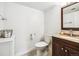 Well-lit bathroom with modern fixtures, vanity with sink, and neutral decor at 9325 Meade St, Westminster, CO 80031