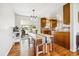 Bright dining area featuring a modern table set, hardwood floors and access to the backyard at 9325 Meade St, Westminster, CO 80031