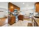 Modern kitchen with granite countertops, stainless steel appliances, and open layout at 9325 Meade St, Westminster, CO 80031