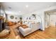 Inviting living room with a brick fireplace, stylish seating, and a cozy atmosphere at 9325 Meade St, Westminster, CO 80031