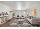 Bright living room with fireplace and large windows at 1475 Monaco Pkwy, Denver, CO 80220