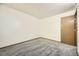 Bedroom with neutral-toned walls and plush carpeting at 12368 W Nevada Pl # 206, Lakewood, CO 80228