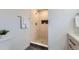 Bathroom featuring an enclosed shower with beige tiling and black fixtures at 9455 W 37Th Ave, Wheat Ridge, CO 80033