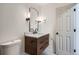 Bathroom vanity with dark hardware and stone countertop at 9455 W 37Th Ave, Wheat Ridge, CO 80033