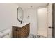 Modern bathroom featuring a sleek vanity, stylish tile flooring, and contemporary fixtures at 9455 W 37Th Ave, Wheat Ridge, CO 80033