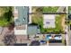 Birds-eye view of a home with a large yard featuring a patio and firepit at 6245 W 53Rd Ave, Arvada, CO 80002