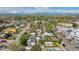 Wide aerial view of the property, city, and mountains in the distance at 6245 W 53Rd Ave, Arvada, CO 80002