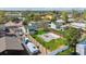 Aerial view of home featuring fenced yard, patio with a firepit, sheds and boat storage at 6245 W 53Rd Ave, Arvada, CO 80002