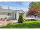 Exterior front view of a single-story home, showing the front yard at 6245 W 53Rd Ave, Arvada, CO 80002