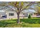 Charming home featuring a well-kept lawn, neat landscaping, and inviting curb appeal at 6245 W 53Rd Ave, Arvada, CO 80002
