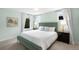 Calming bedroom featuring a plush bed, soft lighting, and elegant decor at 3727 Tejon St, Denver, CO 80211