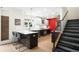 Contemporary kitchen with stainless appliances, island seating, and modern pendant lighting at 3727 Tejon St, Denver, CO 80211