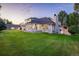 House exterior showcasing a large backyard and landscaping at 17575 E Kettle Pl, Centennial, CO 80016
