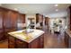 Gourmet kitchen boasting a large island with a stunning countertop at 17575 E Kettle Pl, Centennial, CO 80016