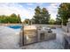 Outdoor kitchen with built-in grill and pizza oven at 17575 E Kettle Pl, Centennial, CO 80016