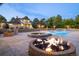 Stunning pool area with fire pit and built-in grill at 17575 E Kettle Pl, Centennial, CO 80016