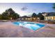 Luxury estate's expansive pool and patio area at dusk at 17575 E Kettle Pl, Centennial, CO 80016