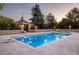 Inviting rectangular pool with diving board and gazebo at 17575 E Kettle Pl, Centennial, CO 80016