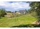 Horse stable in a lush green pasture at 17575 E Kettle Pl, Centennial, CO 80016
