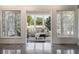 Sunroom with stained glass windows and comfortable seating at 17575 E Kettle Pl, Centennial, CO 80016