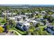 A view of the property showing its proximity to the pool, landscaping, and city skyline in the background at 1820 Newland Ct # 213, Lakewood, CO 80214