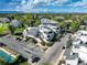 Wide aerial view of neighborhood with multiple buildings and mature trees on a sunny day at 1820 Newland Ct # 213, Lakewood, CO 80214