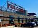 View of Edgewater Public Market, a neighborhood marketplace featuring various food and retail vendors at 1820 Newland Ct # 213, Lakewood, CO 80214