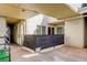 A covered patio provides a private outdoor living space for relaxing or entertaining at 1820 Newland Ct # 213, Lakewood, CO 80214