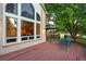 Outdoor deck featuring wood floors, dining space, and stunning views of the surrounding landscape at 2245 Ridgeview Way, Longmont, CO 80504