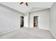 Spacious carpeted bedroom with access to an en-suite bathroom and kitchen at 14333 E Napa Pl # 5D, Aurora, CO 80014