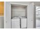 Convenient laundry area featuring washer and dryer hookups within a closet at 14333 E Napa Pl # 5D, Aurora, CO 80014