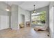 Bright living room with tile floors, fireplace, and large windows at 14333 E Napa Pl # 5D, Aurora, CO 80014