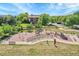 Community playground with slides, swings, benches, and a picnic area at 14333 E Napa Pl # 5D, Aurora, CO 80014