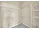 Spacious walk-in closet with shelving provides ample storage solutions for organization at 14333 E Napa Pl # 5D, Aurora, CO 80014