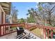 Relaxing balcony with chairs overlooking lush backyard garden at 1545 Steele St, Denver, CO 80206