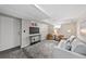 Finished basement featuring a sofa, a TV, and neutral carpet at 1545 Steele St, Denver, CO 80206
