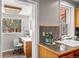 Convenient office nook with natural light and functional desk at 1545 Steele St, Denver, CO 80206