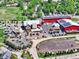 Aerial view of Tivoli Brewing Company with solar panels on the roof at 2957 W Rowland Ave, Littleton, CO 80120