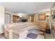 Inviting living room boasting a fireplace, large sofa, and decorative accents at 2957 W Rowland Ave, Littleton, CO 80120