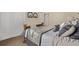 Bedroom featuring a decorative wooden bed frame, carpet, and closet doors at 228 Emerald Ct, Castle Rock, CO 80104