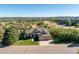 Inviting front view of a home featuring a well-manicured lawn and a convenient three-car garage at 228 Emerald Ct, Castle Rock, CO 80104