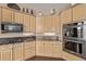 Close up of the gourmet kitchen featuring custom cabinets and stainless steel appliances at 228 Emerald Ct, Castle Rock, CO 80104