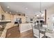 Spacious kitchen with a breakfast nook, stainless steel appliances, and views into the living room at 228 Emerald Ct, Castle Rock, CO 80104